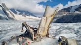 Photos show the wreckage of a 1968 plane crash unearthed by melting glaciers in the Swiss Alps