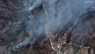 Crews battle deadly New Mexico wildfires as clouds and flooding loom