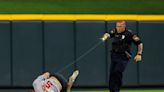 Officer uses Taser on fan who ran onto GABP field, did backflip at Reds-Guardians game