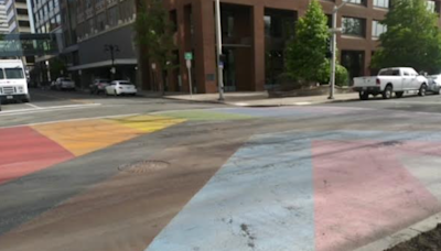 Downtown Spokane rainbow intersection defaced again, this time with fire