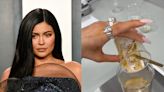 Kylie Jenner sparks backlash for not wearing hairnet or gloves in cosmetics lab