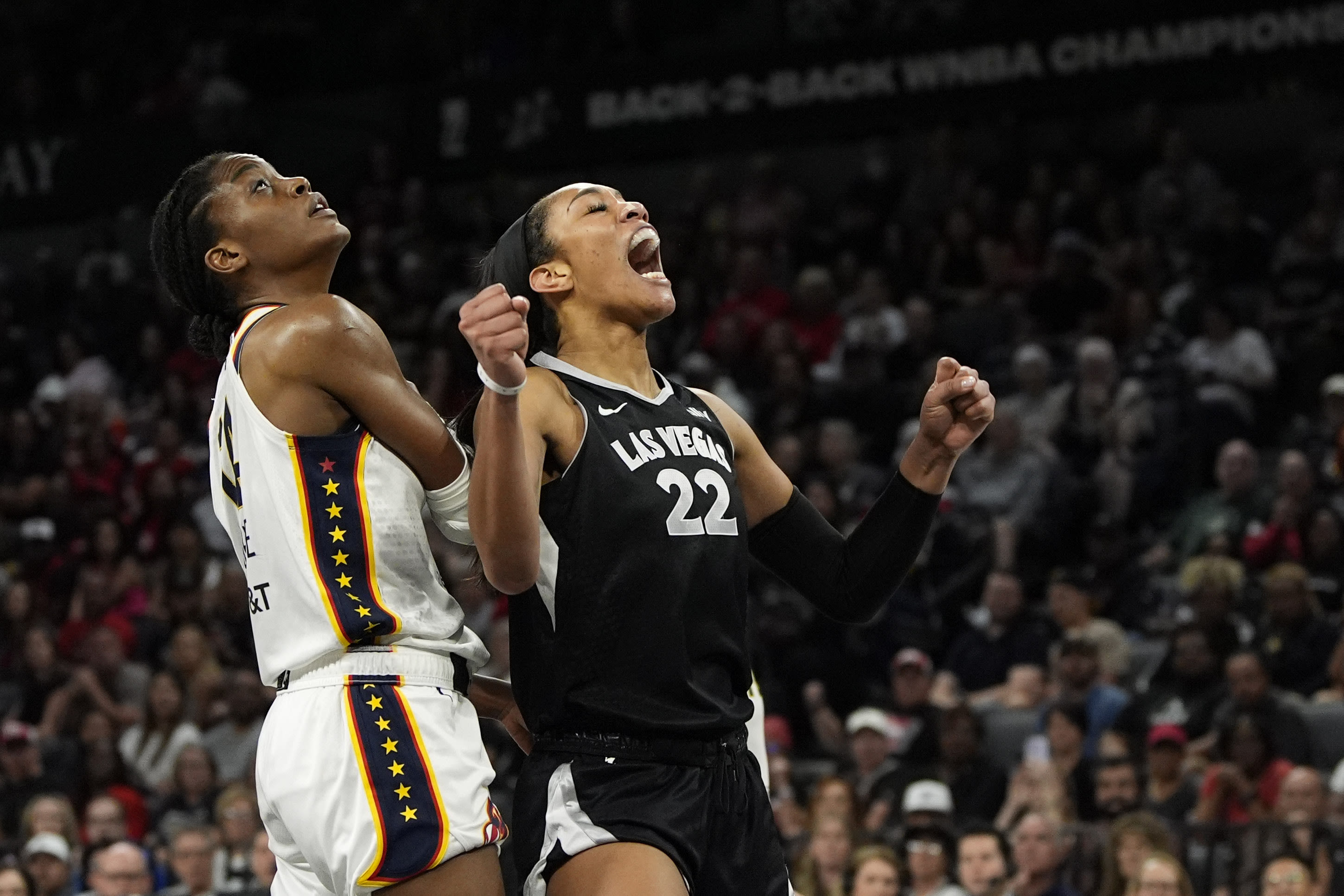 A'ja Wilson totals 29 points and 15 rebounds to lead Aces to 99-80 win over Caitlin Clark and Fever