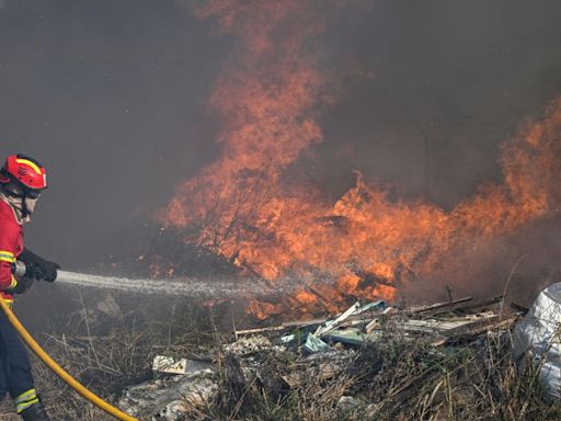 At least two die as wildfires hit Portugal, EU sends help