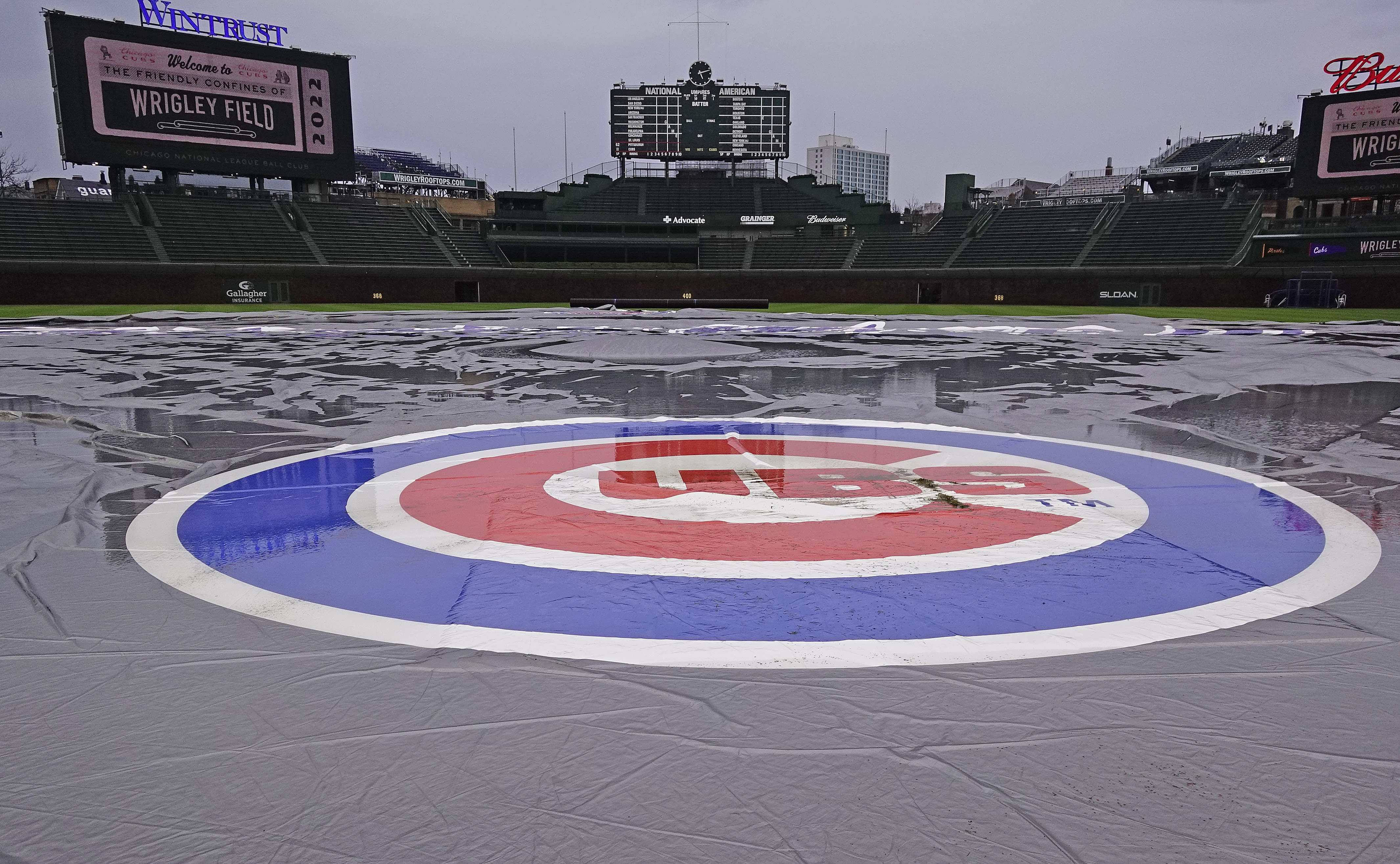 Tuesday's Crosstown Classic at Wrigley Field goes into a rain delay