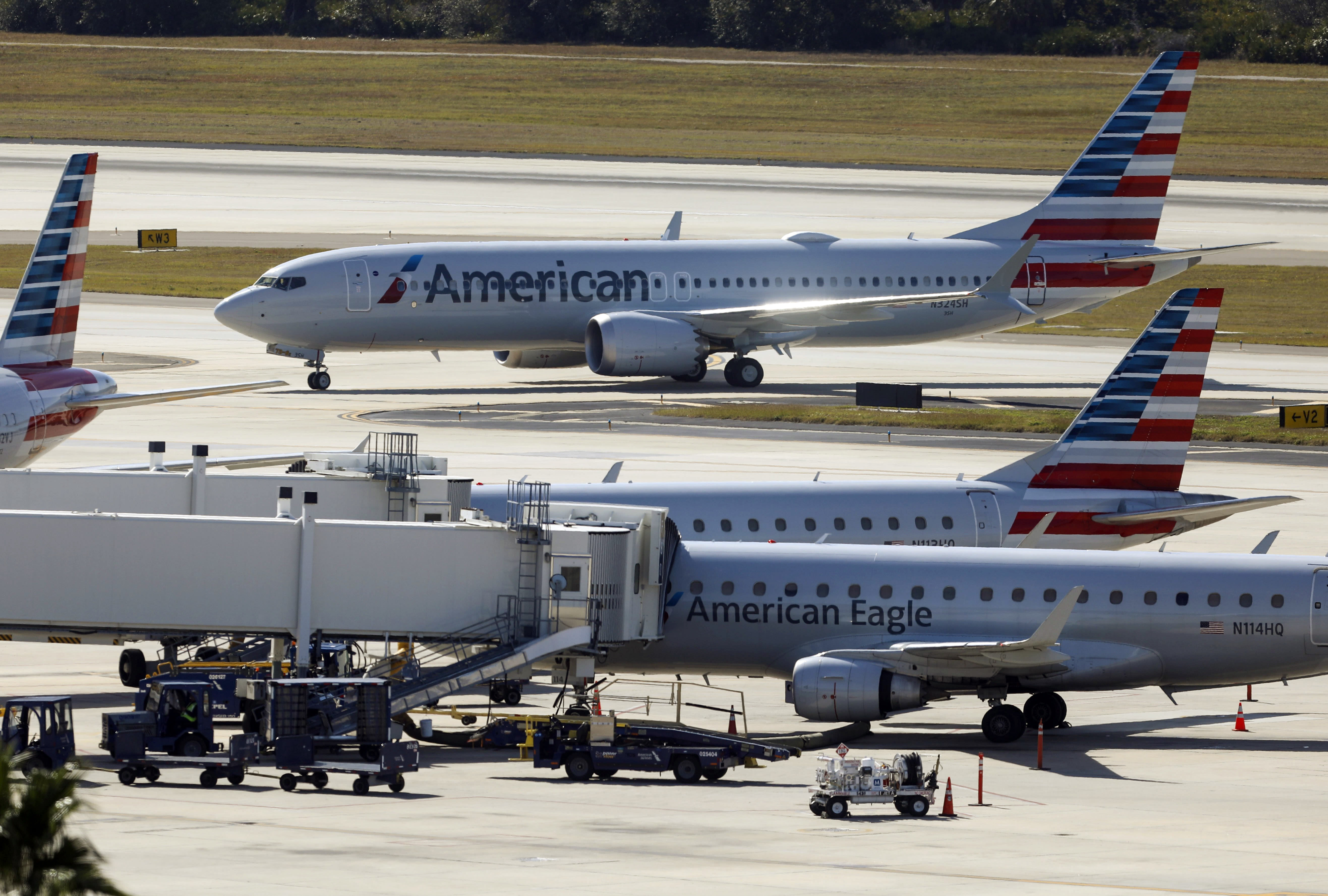 Blown landing-gear tire causes a flight delay at Tampa International Airport; no injuries reported