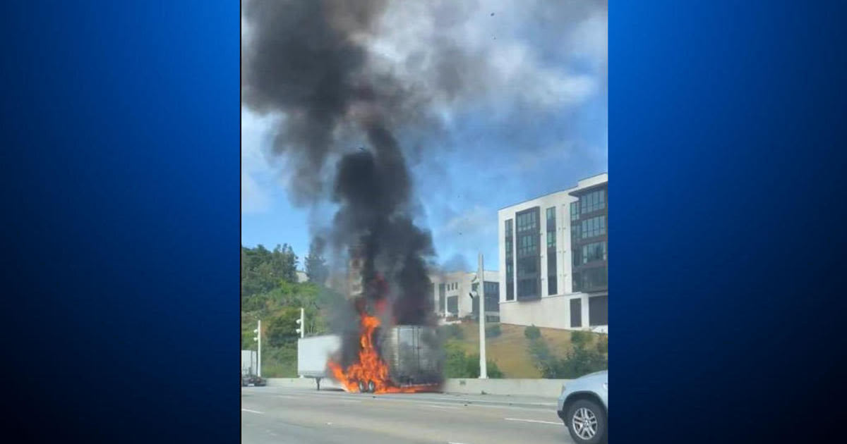Tractor-trailer fire on the westbound Bay Bridge slows traffic at Treasure Island