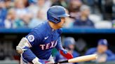 Lowe has 4 hits as Rangers beat Royals 15-4