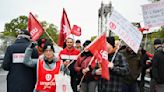 Strikers have shut down a vital Great Lakes shipping artery for days, and negotiations are looming