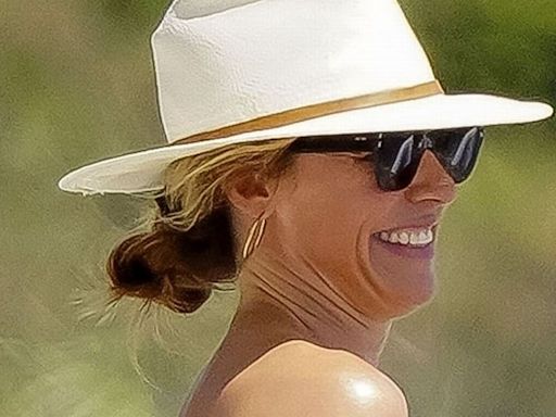 Cat Deeley, 47, looks incredible in a bikini at the beach with TV star husband on break from This Morning