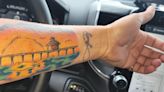 Fort Myers Beach pier tattoo with sunset etched on woman's arm is a masterpiece