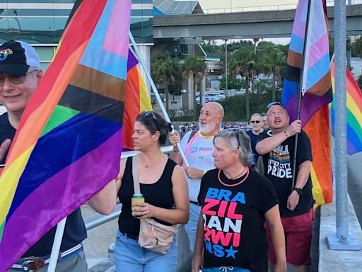 Hundreds 'glow up' Jacksonville bridge in rainbow colors in support LGBTQ+ Pride Month