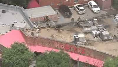 Watch Live: Crews work to put out fire at Dallas Hooters