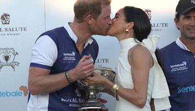 Prince Harry and Meghan Markle Share a Kiss at Charity Polo Match