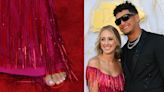 Patrick Mahomes’ Wife Brittany Pops in Bright Red Heels and Fringe Dress for Kansas City Chiefs Super Bowl Ring Ceremony