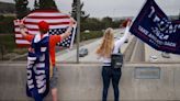 Trump fans turn US flags upside down to protest former president’s conviction