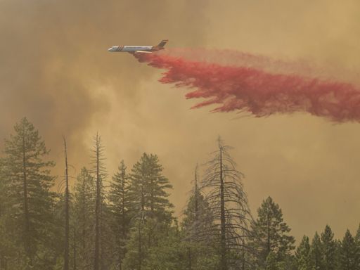 California firefighters make progress as wildfires push devastation and spread smoke across US West