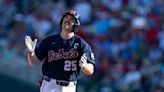 Rebels' roll continues in College World Series win over Hogs
