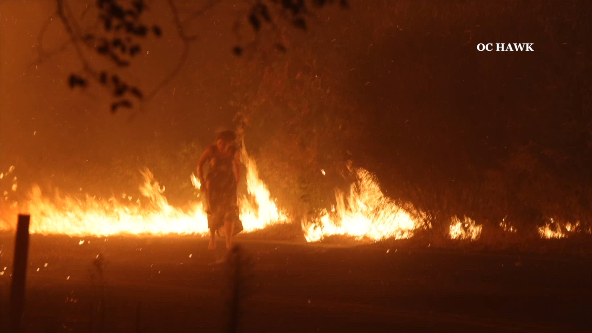 Video shows firefighters rescue woman from blazing Airport fire