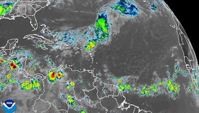 National Hurricane Center tracking 3 tropical waves as heavy rain hits portions of Caribbean