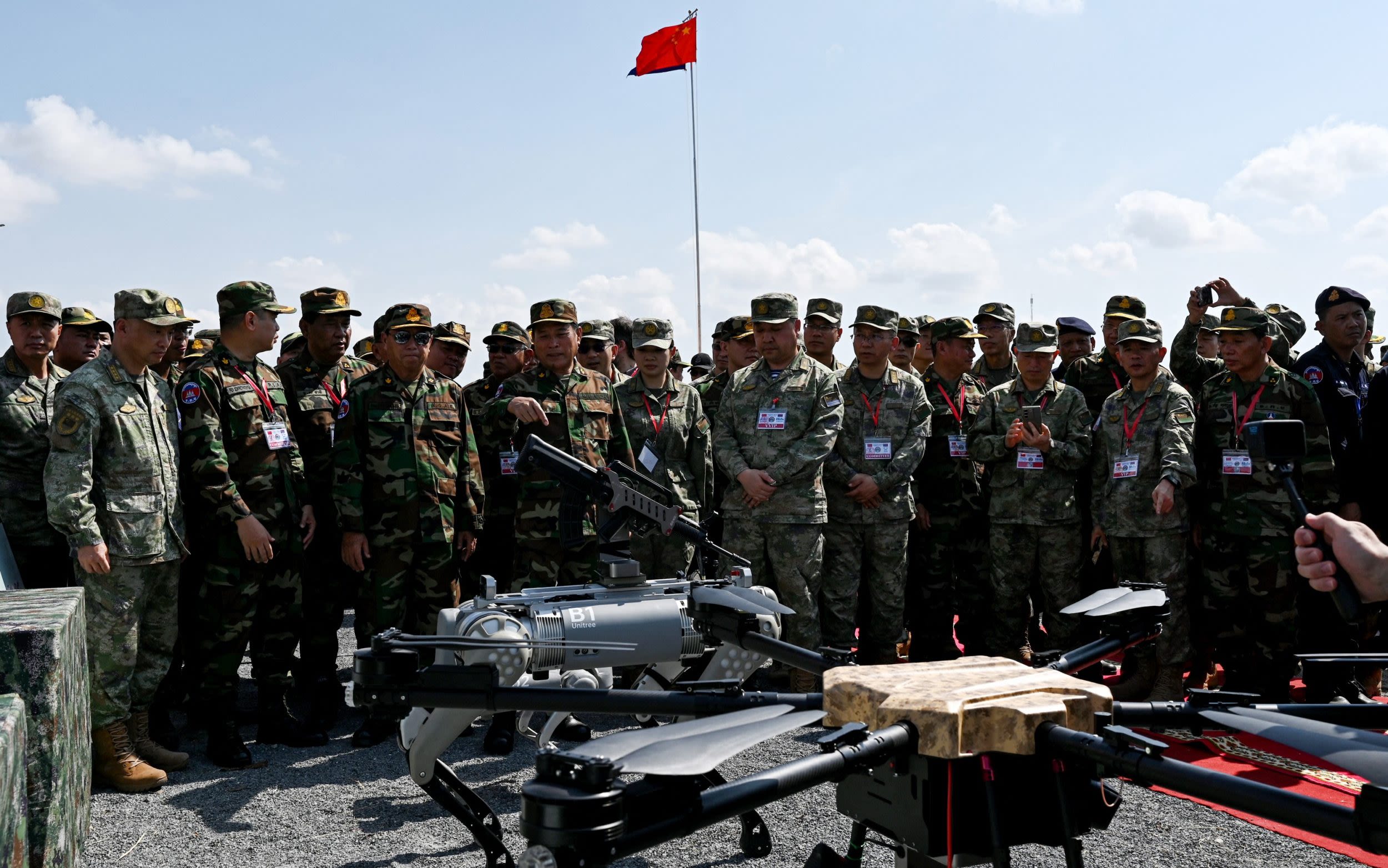 China showcases machine gun-toting robot dogs