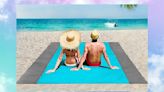 This magical beach blanket that repels sand and water is on sale for just $14 — that's over 50% off