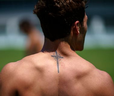 At the Olympics, athletes show guts, glory – and a lot of ink, including tattoos that profess their faith