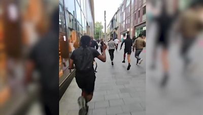Screams as group of people run from violent protests in Liverpool