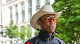 Pharrell Williams cuts a quirky figure during Milan Fashion Week