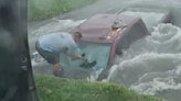 Dramatic video shows Texas couple saving driver from flooded ditch