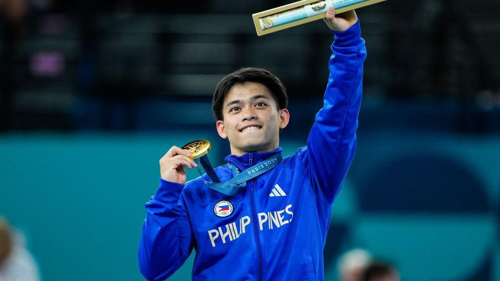 Cash, condo and ramen for Philippine double gold gymnast