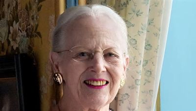 Queen Margrethe of Denmark is picture perfect in a lilac dress as she poses for new portraits released to mark her 84th birthday