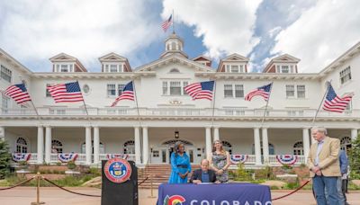Governor Jared Polis visits Estes Park to sign two bills into law