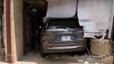 Stolen SUV plows into storefront in Chicago's West Town community