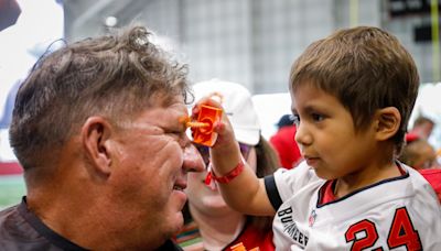 Decade of hope, healing celebrated at Bucs’ Cut and Color Funds the Cure