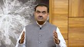 Indian tycoon Adani hit by more losses, calls for probe