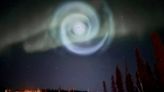 ‘Bewildered’ photographer spots freaky spiral gliding through Alaska’s northern lights
