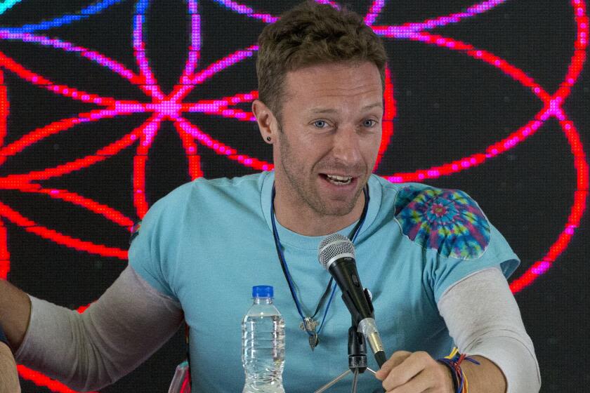 Chris Martin stops Coldplay show after comic tries to rush stage wrapped in Israeli flag