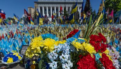 A precious moment in time of war: Flowers for a wife and daughter coming home to Ukraine