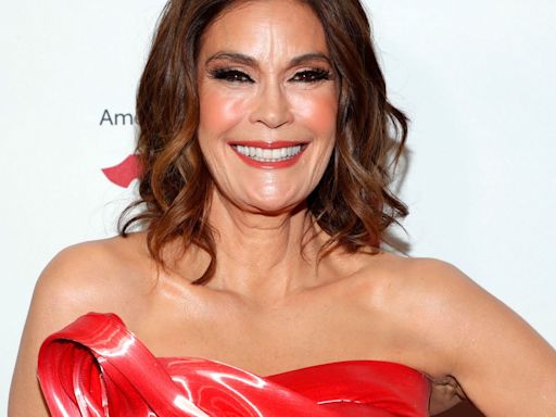 Teri Hatcher, 59, stuns in tiny red bikini during 'first true vacation in years'