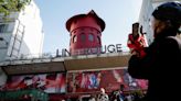 Windmill sails mysteriously fall off Paris' iconic Moulin Rouge cabaret