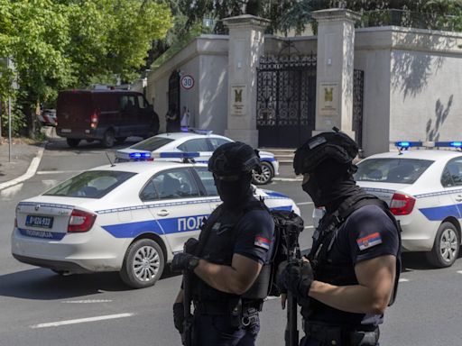 Crossbow attacker wounds a police officer guarding Israel's embassy in Serbia before being shot dead