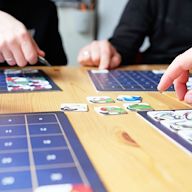 A board game that is designed to be played in a social setting, such as a party or gathering. Often involve humor, fast-paced gameplay, and easy-to-learn rules. May include elements of trivia, physical challenges, or social deduction.