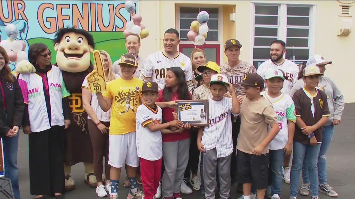 Padres All-Star Manny Machado congratulates students at Paradise Hills Elementary for top attendance