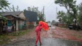 Cyclone floods coastal villages, blows away thatched roofs and cuts power in Bangladesh and India