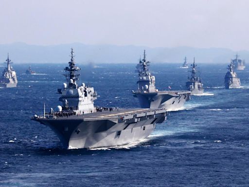 Japan defense chief urges higher security after drone video of warship posted on China social media