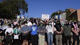 Hundreds of pro-Palestinian protesters remain on UCLA campus despite police ordering them to leave