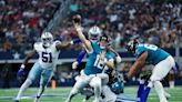 Nathan Rourke, former Ohio QB with Jacksonville, escapes Dallas pressure for TD pass