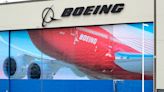 Boeing locks out its firefighters amid union fight for pay