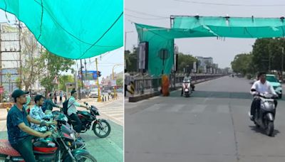 Indore Municipal Corporation Puts Green Net At Traffic Signals To Provide Temporary Relief To Commuters In Scorching ...