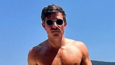 Will Best displays his toned physique in shirtless holiday snaps